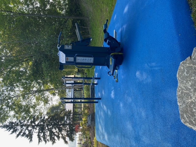 User performing core training on the Outdoor-Fit Apollo Multigym at MOVE Fitness Park in Huntsville.