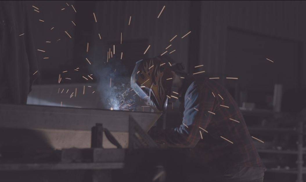 Welding commercial outdoor fitness equipment for durable park installations
